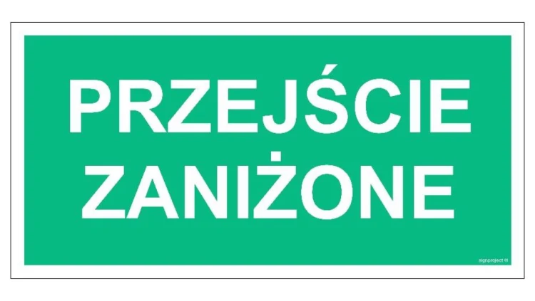 ZNAK - AC039 Przejście zaniżone 20 x 10 cm FS - Folia samoprzylepna foto.